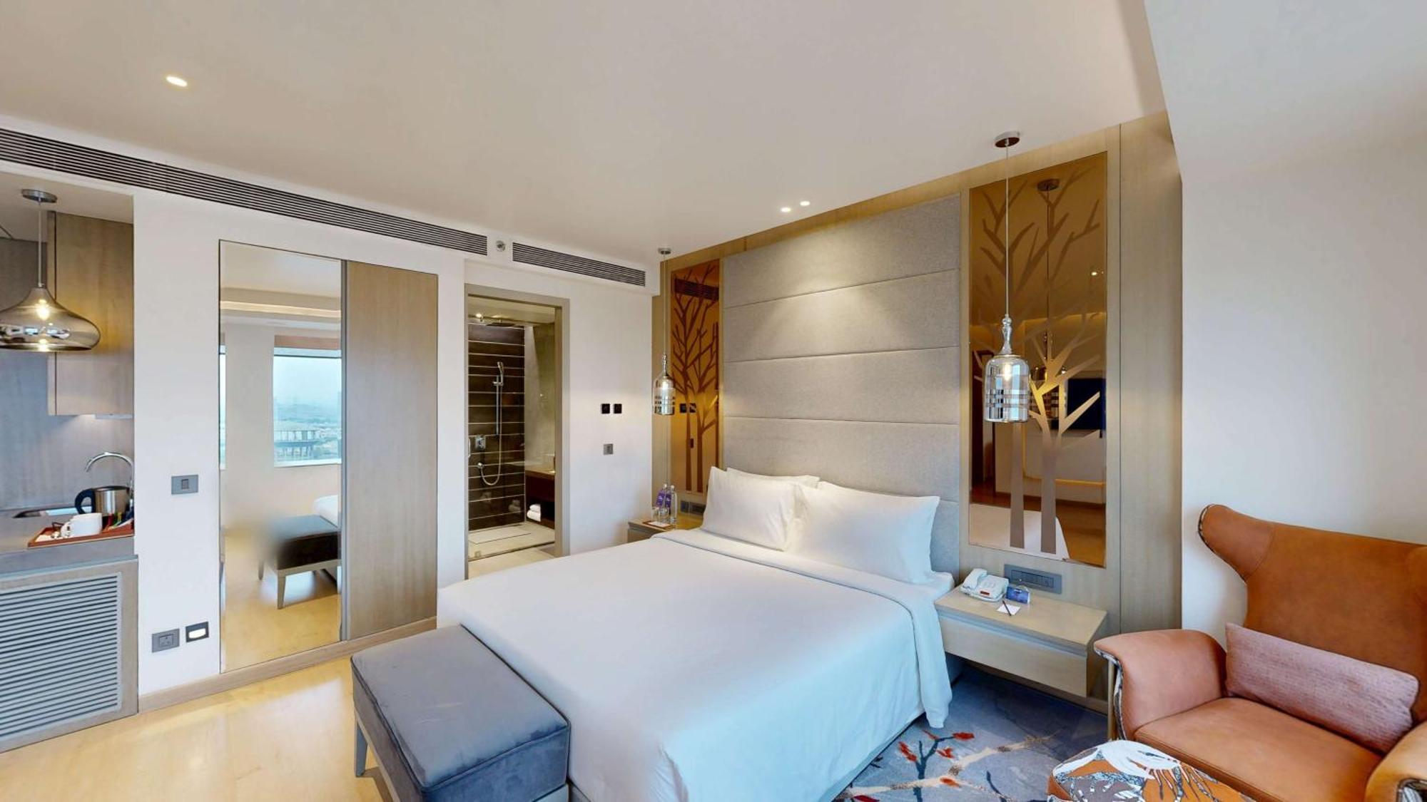 德里ncr-卡萨比塔丽笙蓝标酒店 加济阿巴德 外观 照片 A bedroom at the hotel