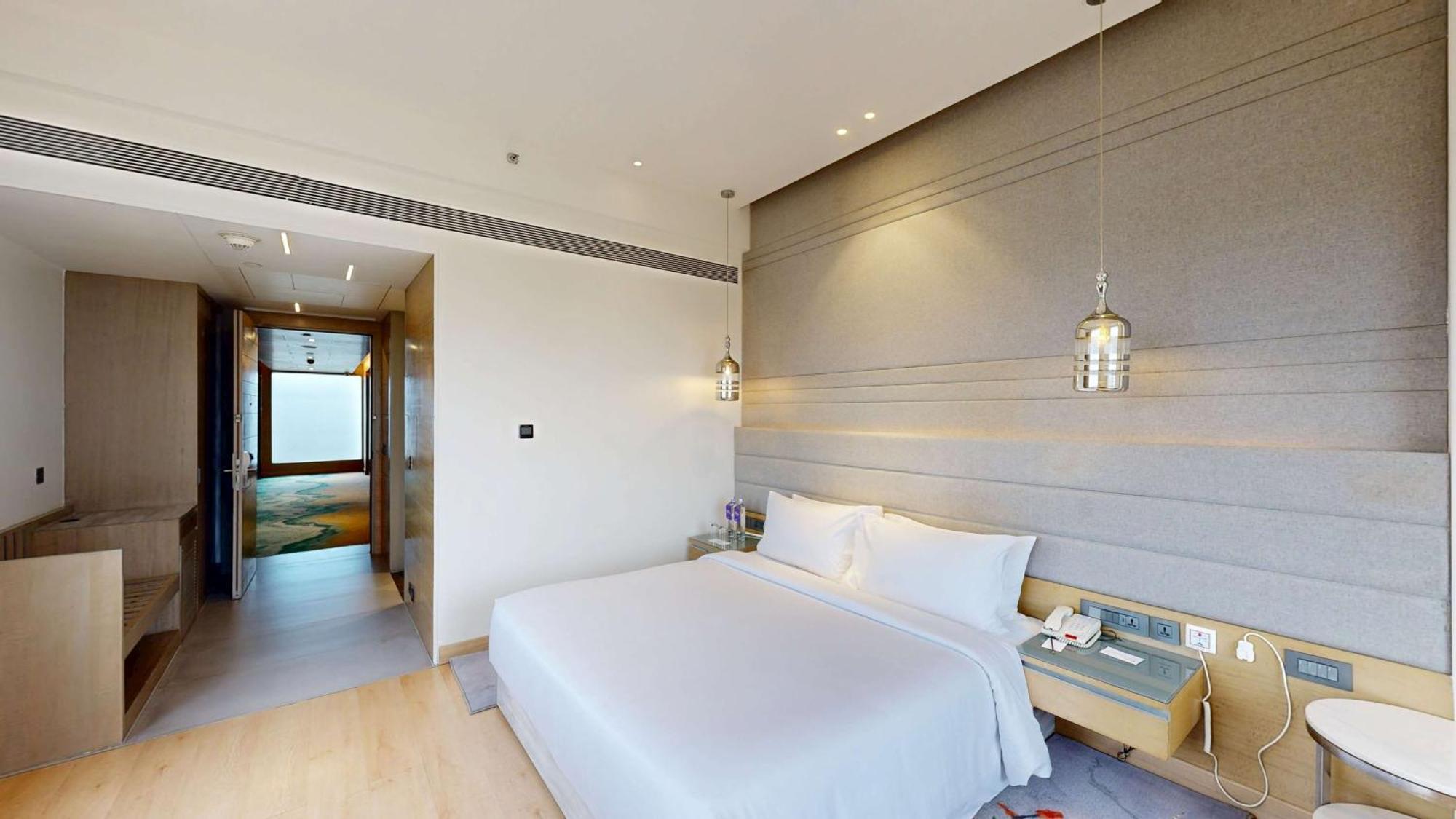 德里ncr-卡萨比塔丽笙蓝标酒店 加济阿巴德 外观 照片 A bedroom at the hotel